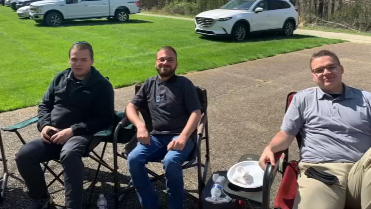 LMPD Officer Nick Wilt with brothers Alex and Zack